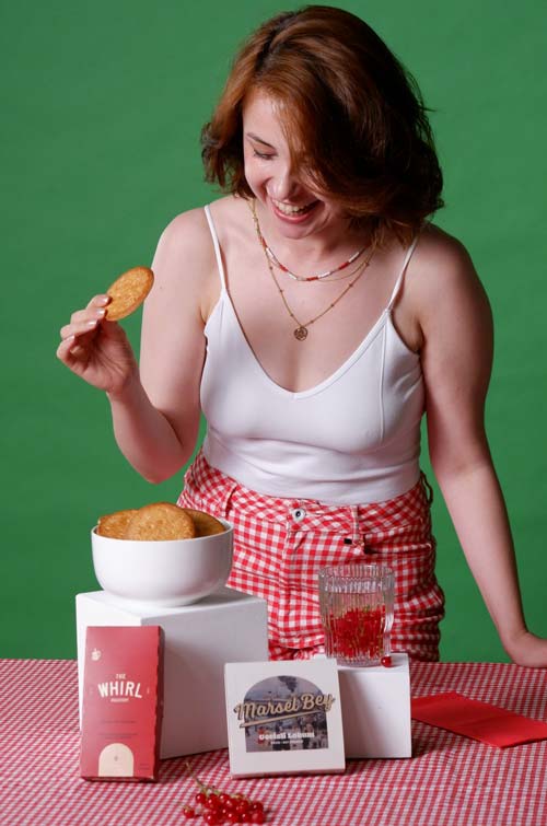 woman in bra promoting some kind of food